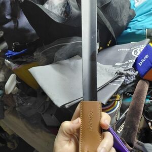 ZOMAKE stainless steel shoe horn with a leather handle cover.